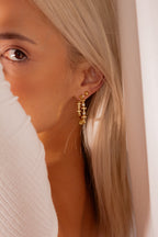 Cross hoops earrings