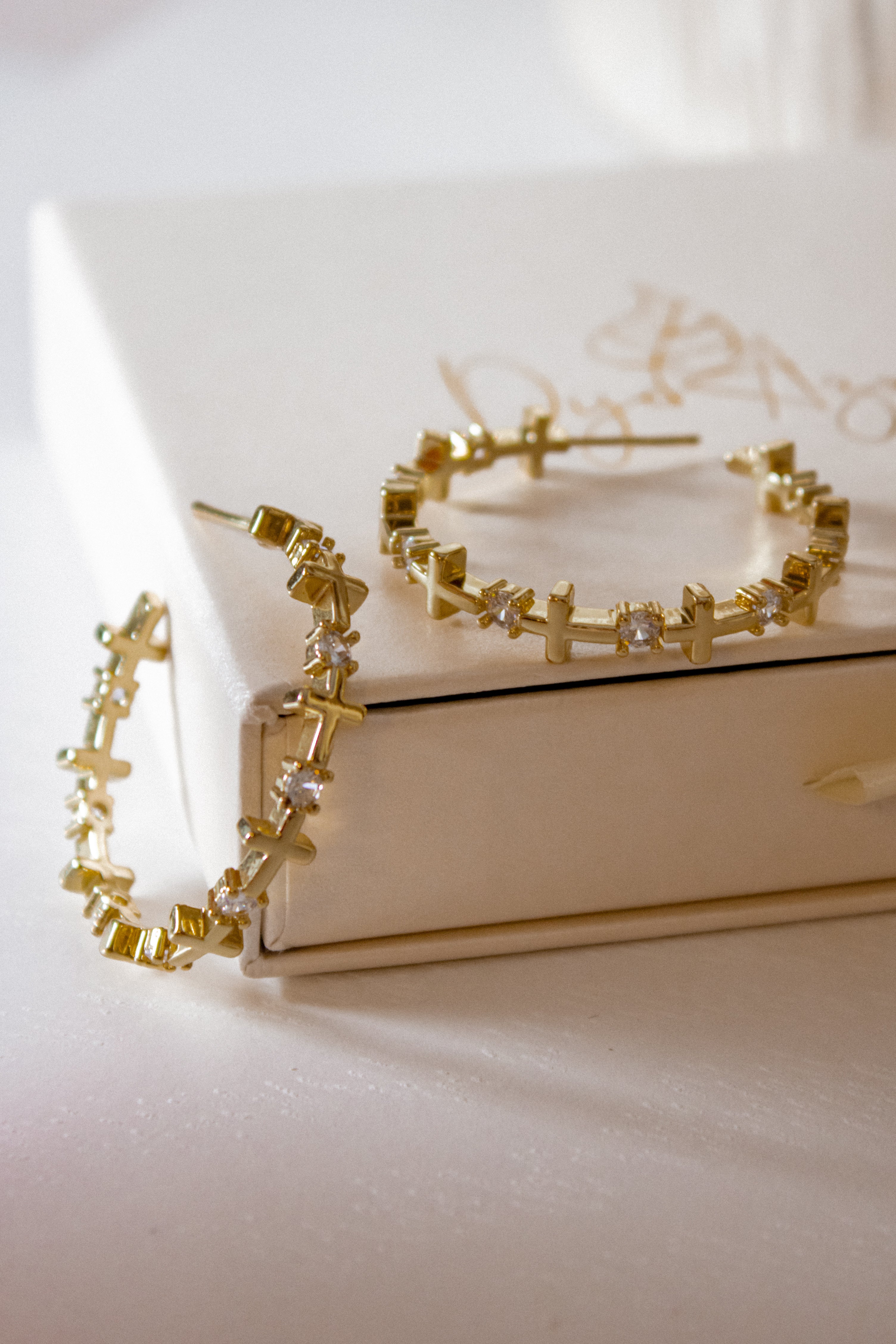 Cross hoops earrings